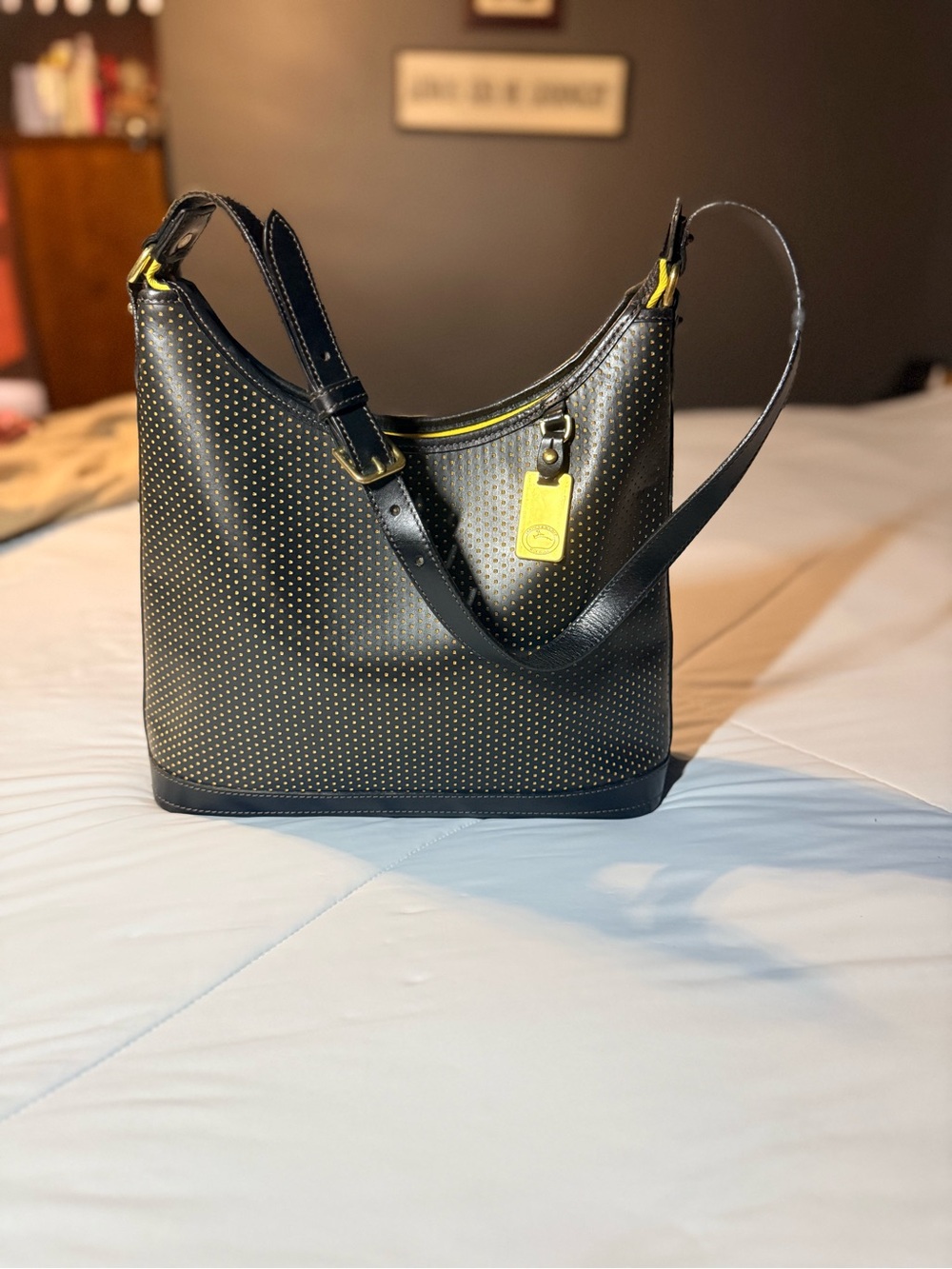 Dooney & Bourke Black Perforated Shoulder Bag with Yellow Accent
